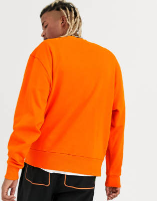 bright orange sweatshirt