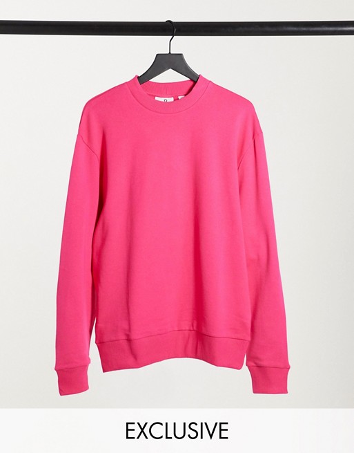 COLLUSION Unisex sweatshirt in pink