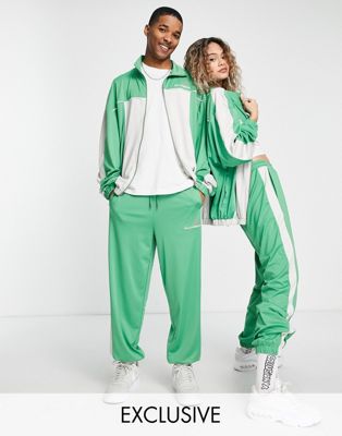 COLLUSION Unisex track joggers in green co-ord - ASOS Price Checker