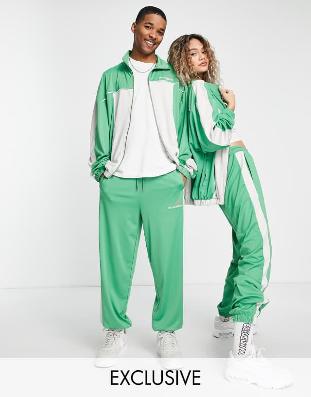 COLLUSION Unisex track sweatpants in green - part of a set