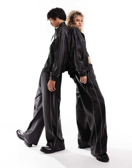 COLLUSION Unisex trackies in black PU (part of a set)