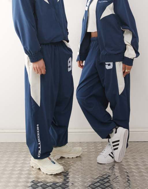 COLLUSION Unisex - Trainingspak met nylon inzetstukken in blauw, deel van co-ord set, 2 van 5