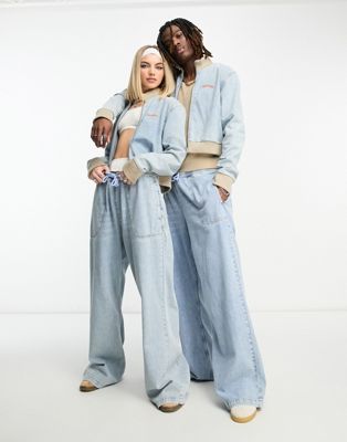 COLLUSION Unisex wide leg jeans with stitched branding co-ord in light blue