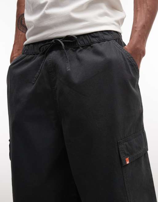 COLLUSION utility short in black, 3 of 5