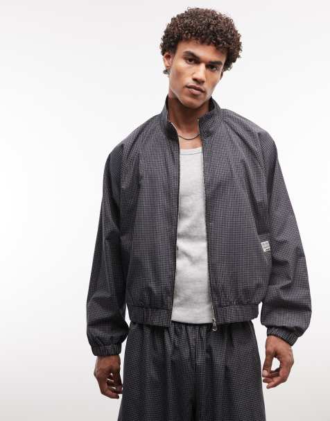 COLLUSION - Veste de survêtement oversize à capuche - Carreaux noirs - view 1