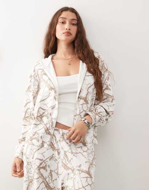 COLLUSION – Vit, skogsmönstrad huvtröja med boxig passform och dragkedja - view 1