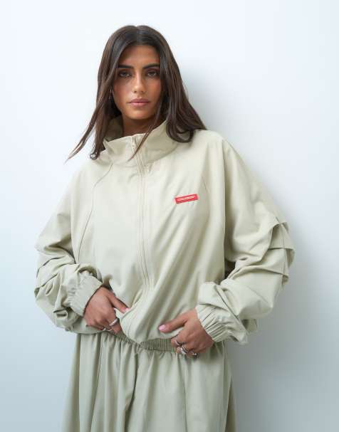 COLLUSION volume pleated nylon track jacket in stone co-ord - view 1