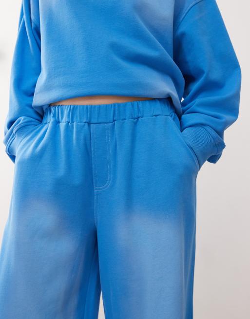 COLLUSION washed blue low rise baggy joggers with logo patch co-ord, 3 of 5