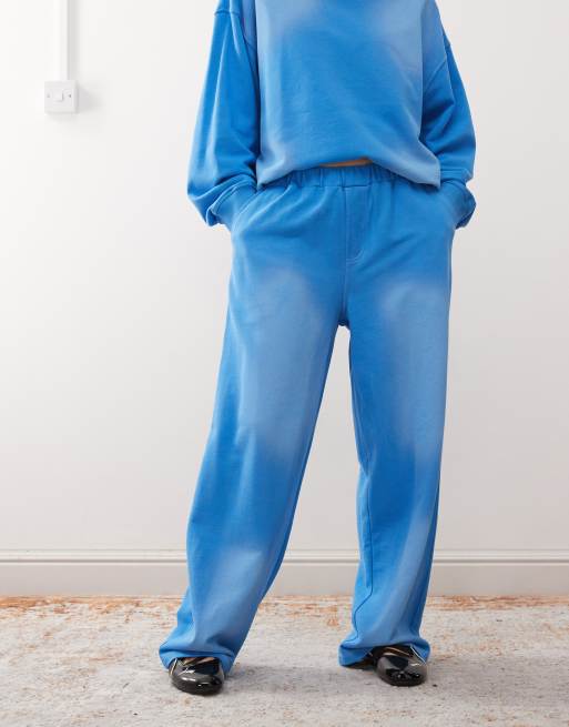 COLLUSION washed blue low rise baggy joggers with logo patch co-ord, 5 of 5