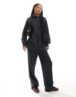 COLLUSION Plus oversized sweatpants with branded bum print in