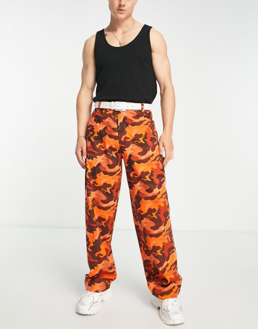 COLLUSION – Weit geschnittene 90er-Hose mit Military-Muster in Orange