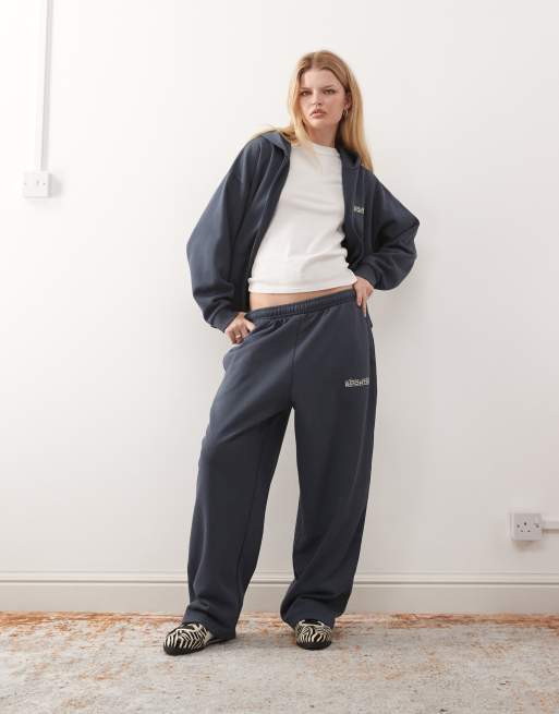 COLLUSION – Weite Oversize-Jogginghose mit Vintage-Waschung in Marineblau, Kombiteil