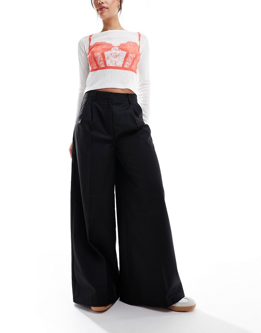COLLUSION wide leg baggy tailored trousers in black