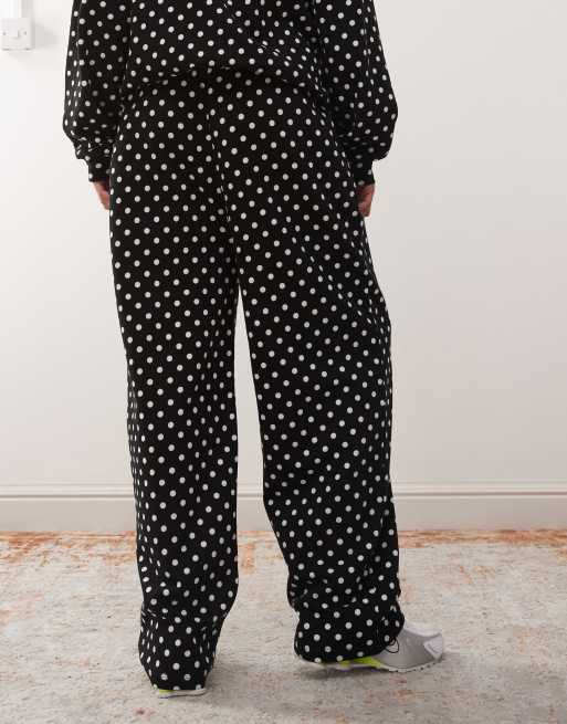 COLLUSION wide leg sweatpants in black and white polka dots