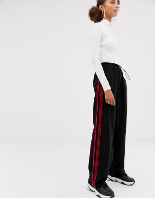 black wide leg trousers with side stripe