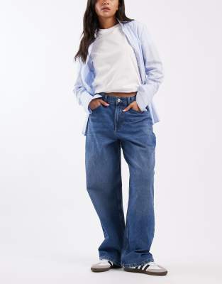 COLLUSION - X001 - Antifit-Jeans in Mittelblau mit mittelhohem Bund