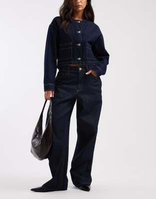 COLLUSION - X001 - Antifit-Jeans in Mittelblau mit Rinse-Waschung-Marineblau