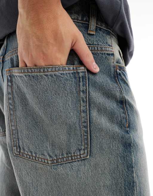 COLLUSION X014 antifit jeans in stonewash blue