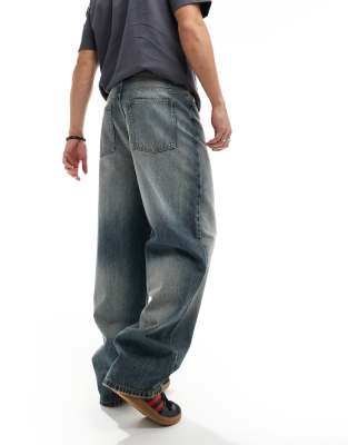 COLLUSION X014 antifit jeans in stonewash blue