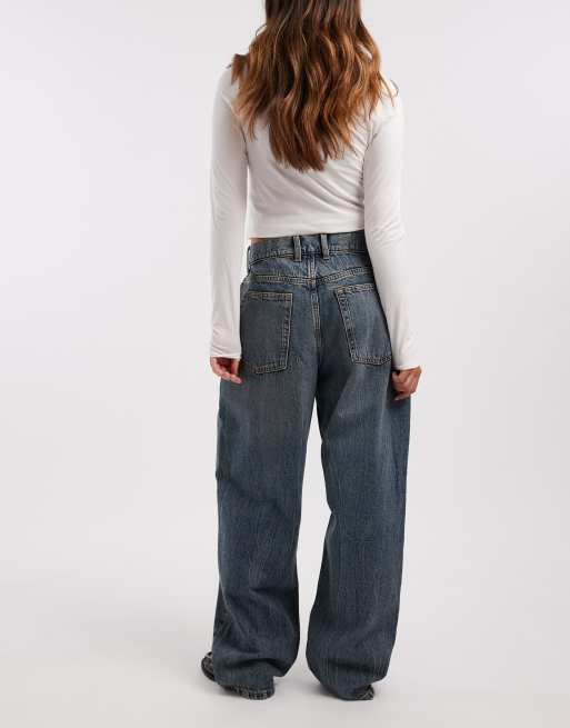 COLLUSION antifit mid rise jeans in mid blue marble