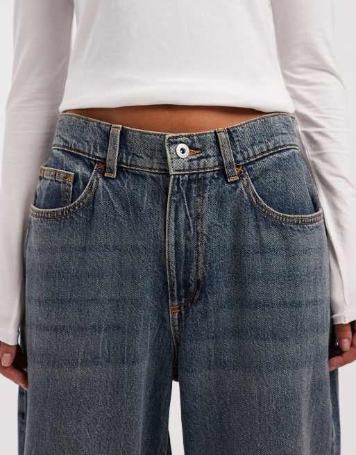 COLLUSION antifit mid rise jeans in mid blue marble