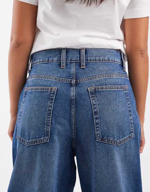 COLLUSION antifit mid rise jeans in mid blue
