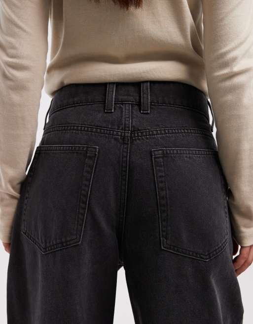 COLLUSION antifit mid rise jeans in washed black