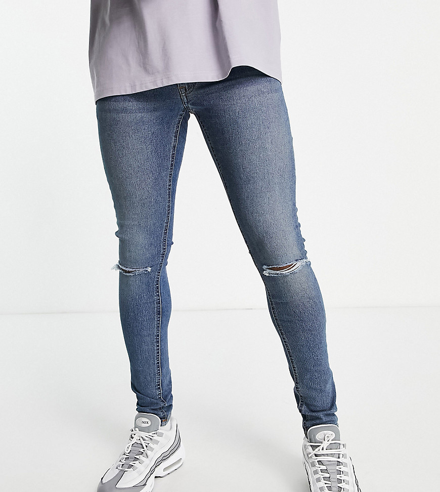 COLLUSION x001 super skinny jeans with knee rip in mid washed blue