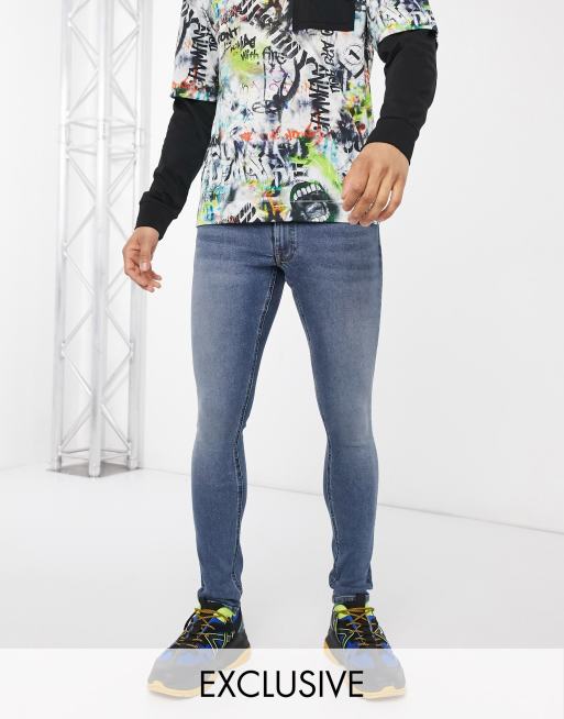 COLLUSION - x001 - Superskinny jeans in middenblauw met wassing