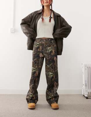 Collusion X002 baggy jeans in tree camo print