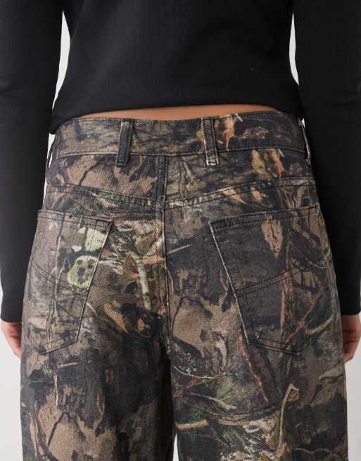 COLLUSION x002 baggy jeans in tree camo print