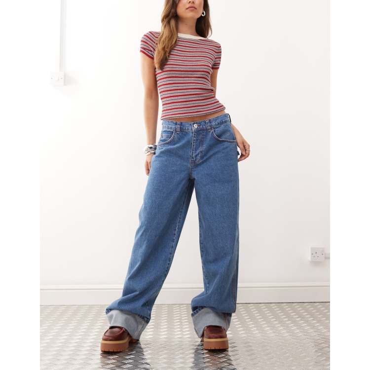 COLLUSION X002 baggy jeans with cuffed hems in mid wash with red
