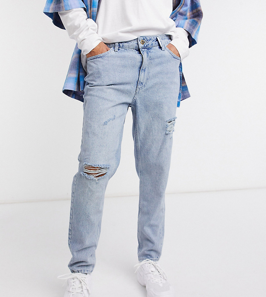 COLLUSION x003 – Blå stentvättade jeans med avsmalnande ben och slitna knän