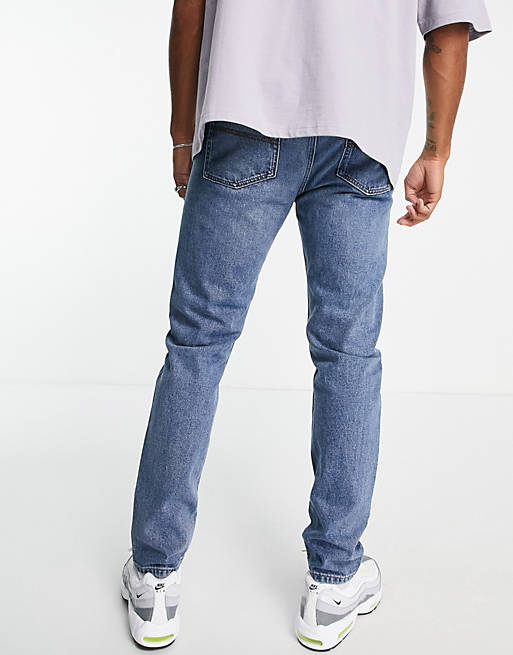 X003 cotton tapered jean in mid wash blue MBLUE Asos Men Clothing Jeans Tapered Jeans 