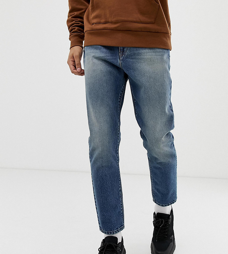 COLLUSION - x003 - Jeans met smaltoelopende pijpen en donkere stonewash-Beige