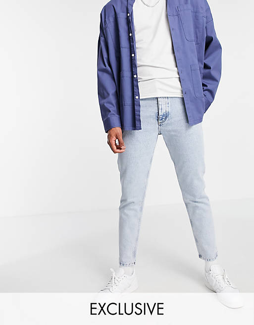COLLUSION x003 tapered jeans in light wash blue
