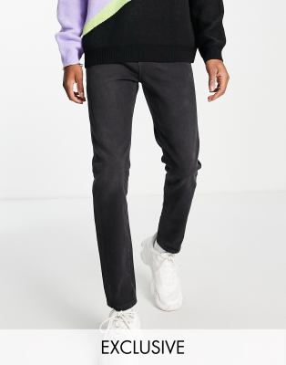 x003 tapered jeans in washed black