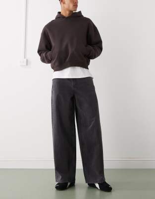 X003 - Weit geschnittene Jeans in verwaschenem Schwarz mit mittelhohem Bund Schwarz W36 L30