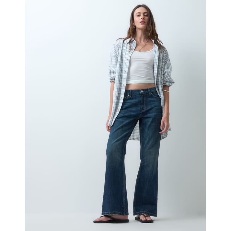 COLLUSION X005 relaxed bootcut jeans in 90s slubby dark wash | ASOS