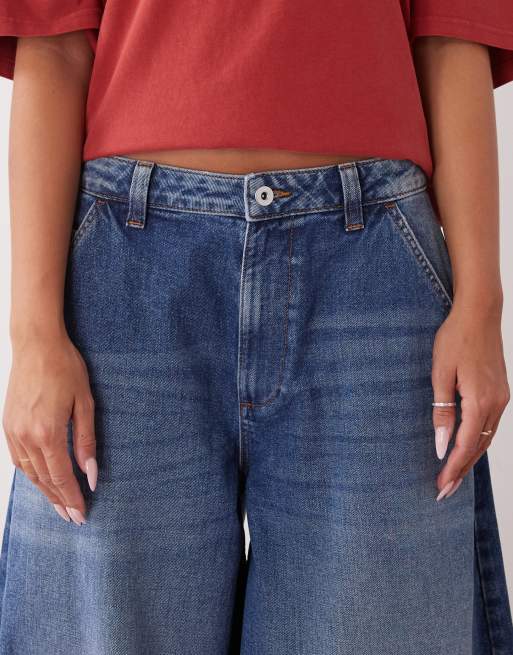 COLLUSION XL balloon low rise jeans in mid blue