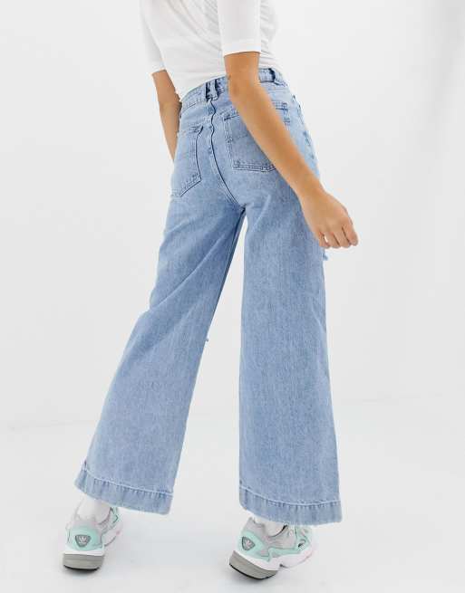 Jeans with best sale large rips