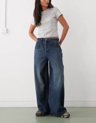 Collusion COLLUSION X007 XL baggy low rise jean in grunge slubby mid wash-Navy