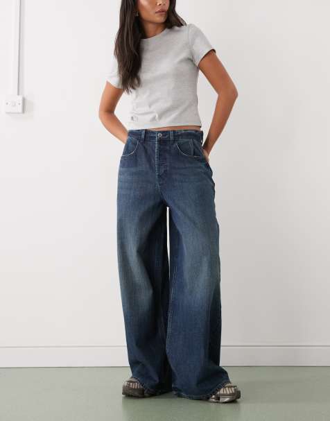 COLLUSION X007 XL baggy low rise jean in grunge slubby mid wash