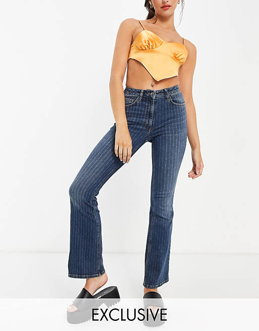 Jeans COLLUSION x008 low rise flares with collusion pin stripe 
