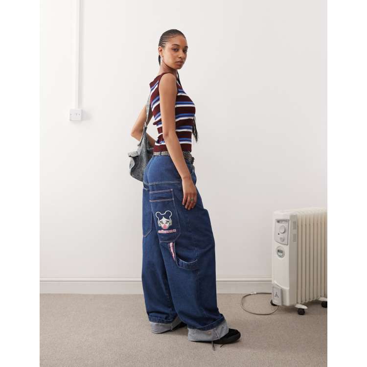 COLLUSION X008 Skater jeans in midwash with embroidery - MBLUE | ASOS