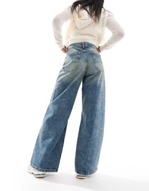COLLUSION x013 - Jeans met wijde pijpen en halfhoge taille in mid-wash, 2 van 5
