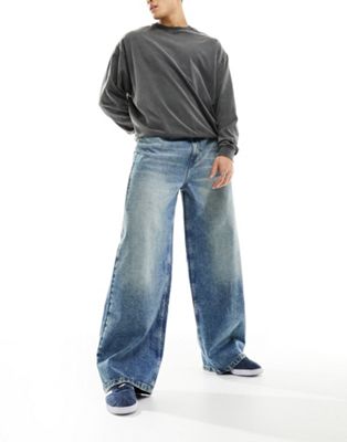 COLLUSION x013 mid rise wide leg jeans in midwash