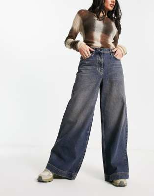 Collusion X023 Ultra Baggy Jeans In Dirty Washblue ModeSens