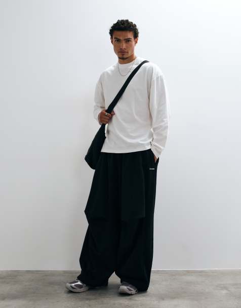 COLLUSION XL baggy sweatpants in black - view 1