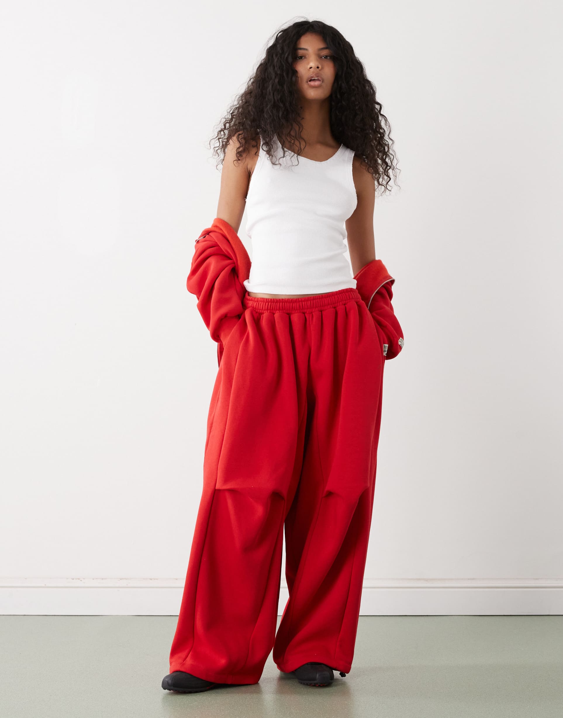 collusion xl baggy sweatpants in red
